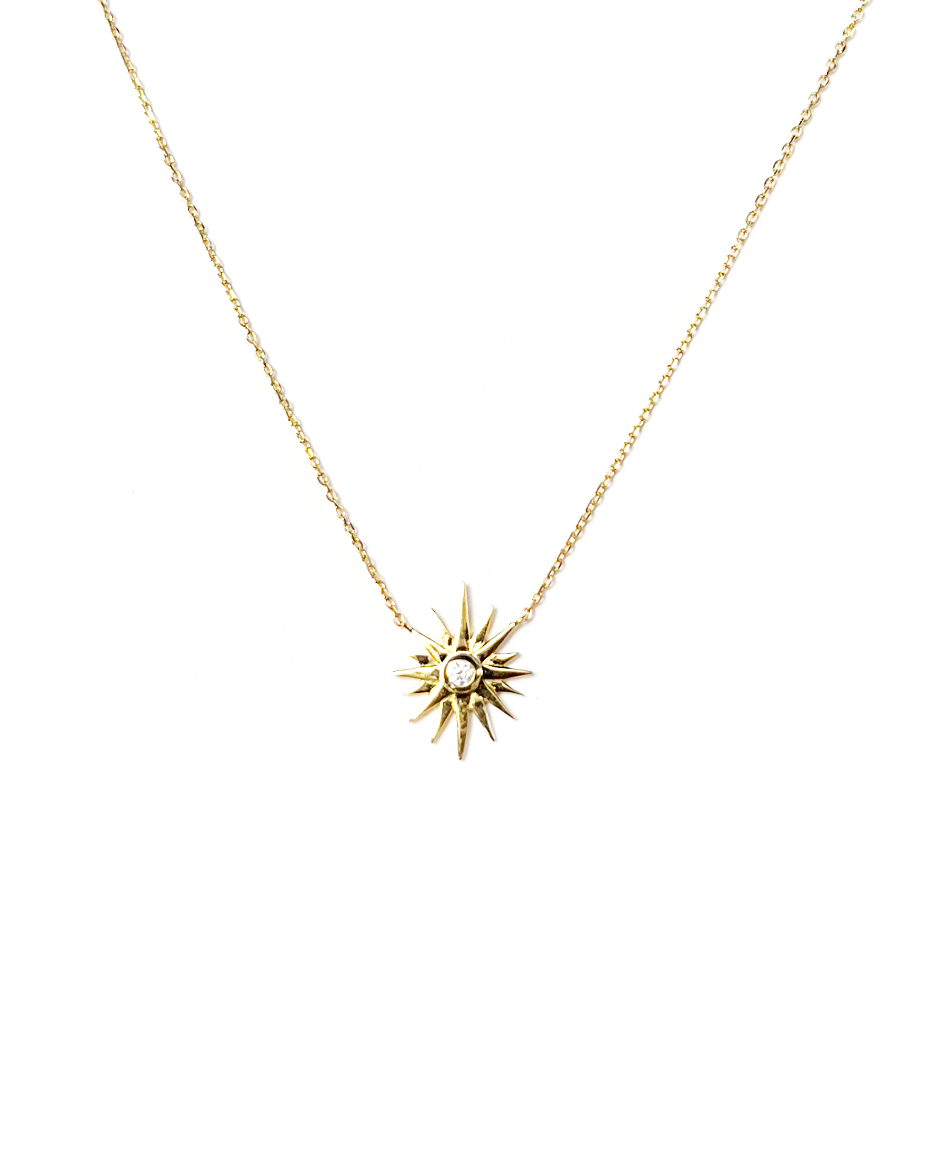 Wonder Star Necklace | 
                    18k gold and high quality cubic zirconia stones.