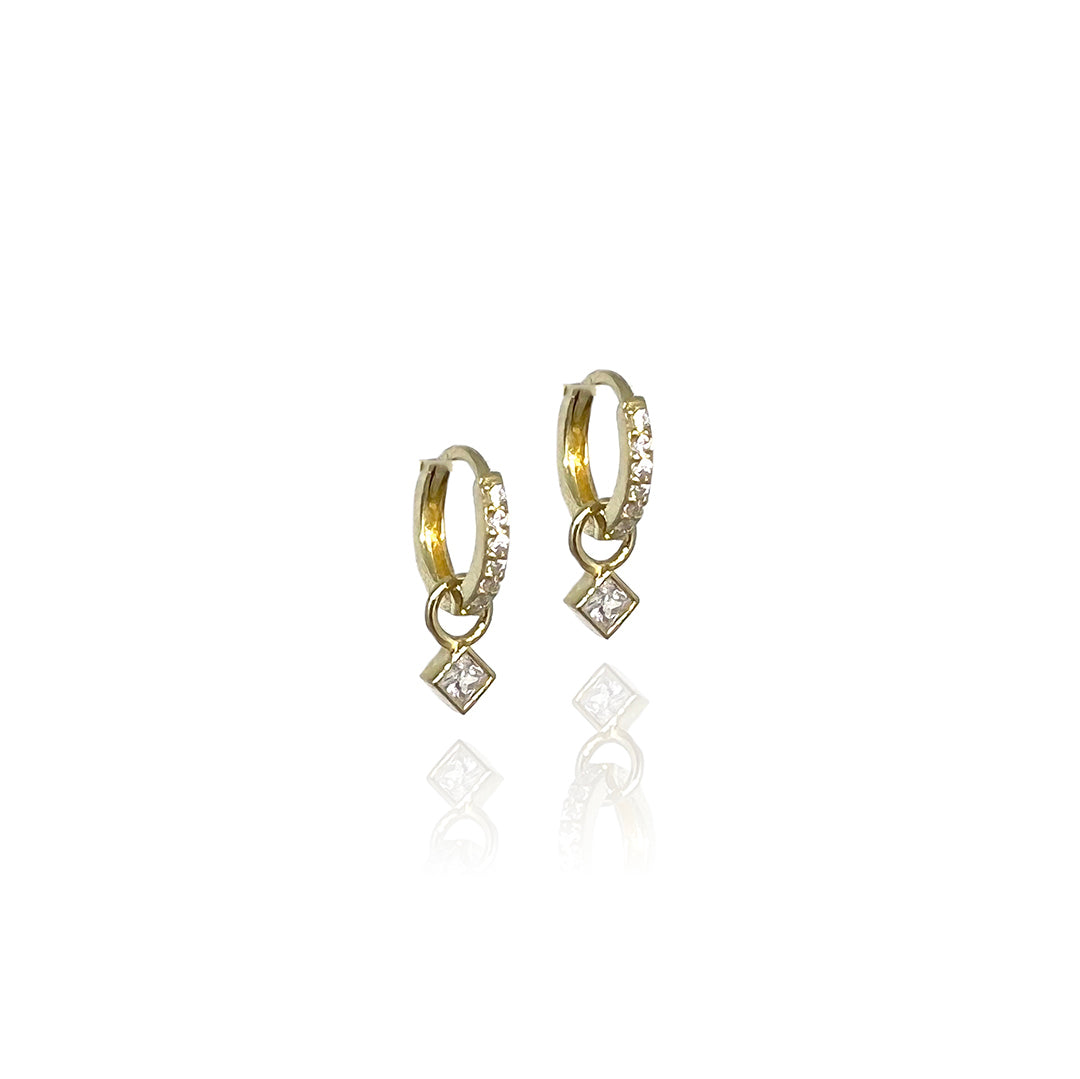 Diamond Drop Huggie Hoops | 
                    18-karat gold and high quality of cubic zirconia stones.